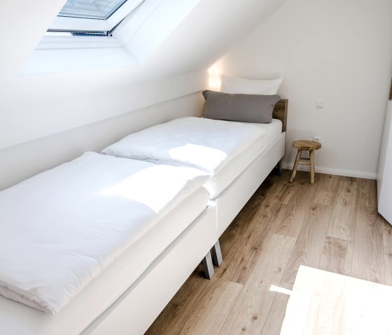 Schlafzimmer mit Einzelbett, © Fotostudio Uschi Kitschke Schlafzimmer mit Einzelbett, © Fotostudio Uschi Kitschke