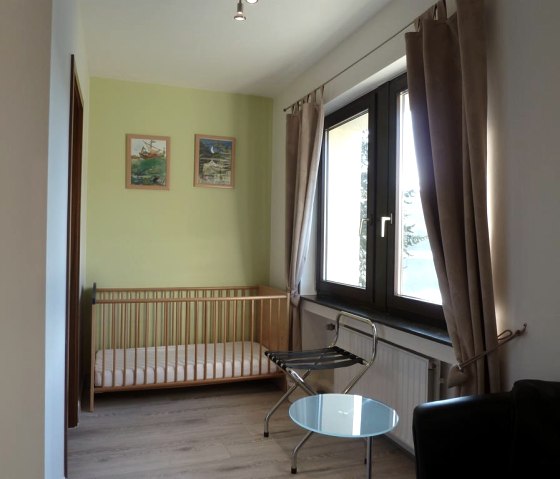 Zimmer Seeblick m. eig. Bad und Kinderbett, © Ewert Zimmer Seeblick m. eig. Bad und Kinderbett, © Ewert