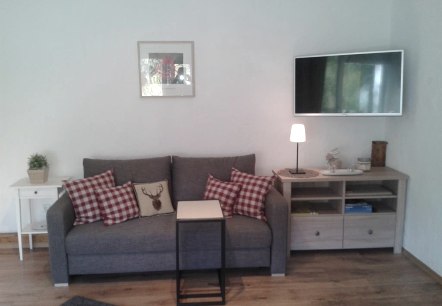 Wohnzimmer Ferienhaus, © Nordeifel Tourismus GmbH & Jugendherberge Hellenthal Wohnzimmer Ferienhaus, © Nordeifel Tourismus GmbH & Jugendherberge Hellenthal