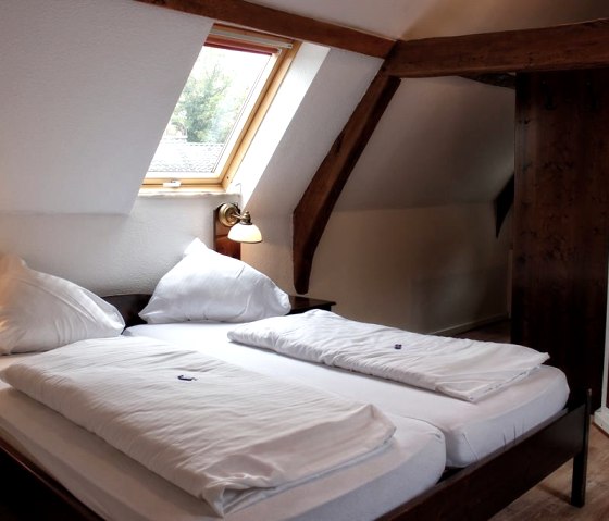 Hotelzimmer unter dem Dach Hotelzimmer unter dem Dach