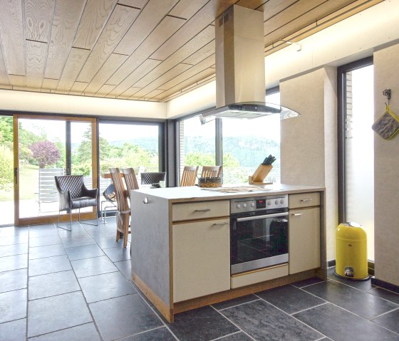 Kitchen with view to the dining area Kitchen with view to the dining area