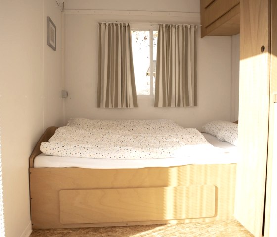 Bett, © Nordeifel Tourismus GmbH & Naturerlebnis Bauwagen-Heinrichshof Bett, © Nordeifel Tourismus GmbH & Naturerlebnis Bauwagen-Heinrichshof