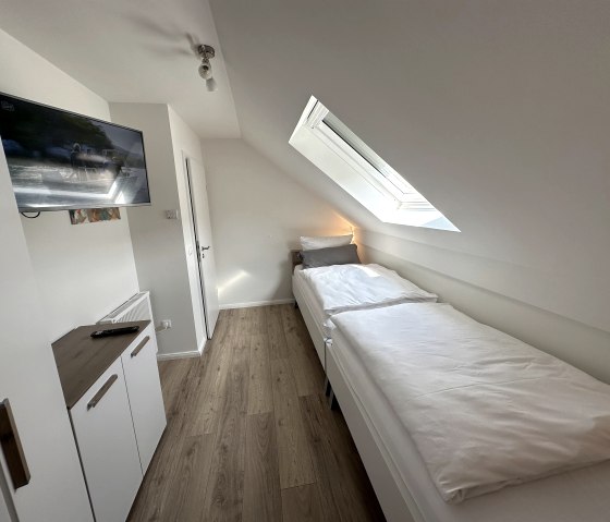 Schlafzimmer mit Einzelbetten, © Tobi's Eifelhaus Schlafzimmer mit Einzelbetten, © Tobi's Eifelhaus