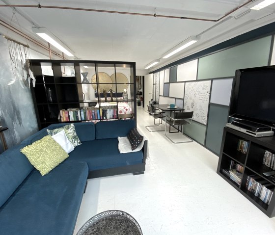 Corner sofa in the studio with TV and DVD