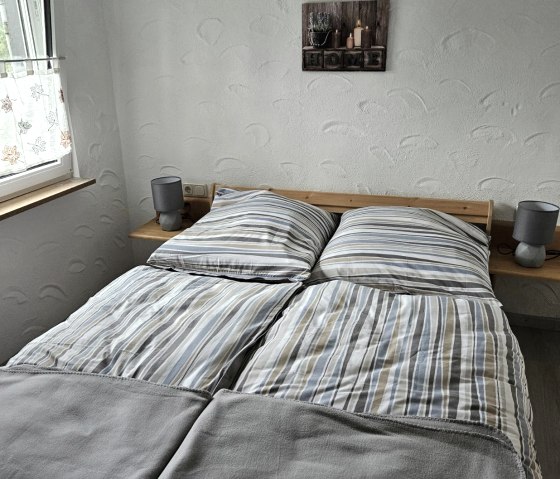Schlafzimmer mit Bett