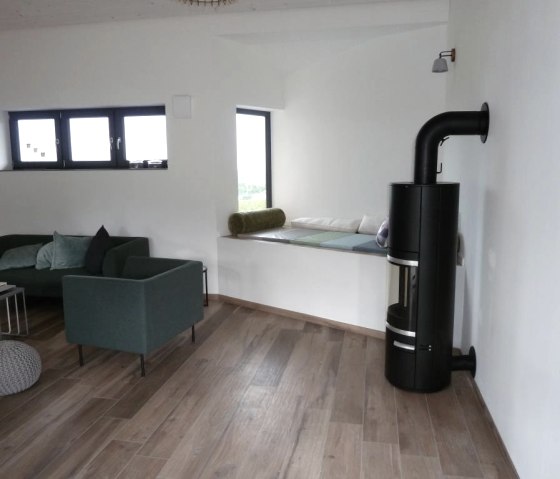 Entspannen vor dem Kamin, &copy; FeWo Eifel-Eichen