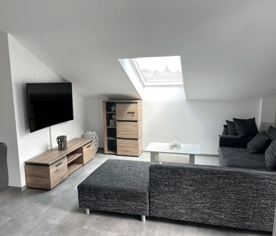 Ferienwohnung "Weiher Lounge" - Wohnzimmer