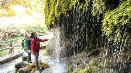 Refreshment at the Dreim&uuml;hlen waterfall on the Eifelsteig trail, &copy; Eifel Tourismus GmbH, D. Ketz