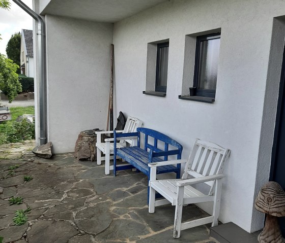 Seat next to the entrance, &copy; Nordeifel Tourismus GmbH  & FW Schwerfen