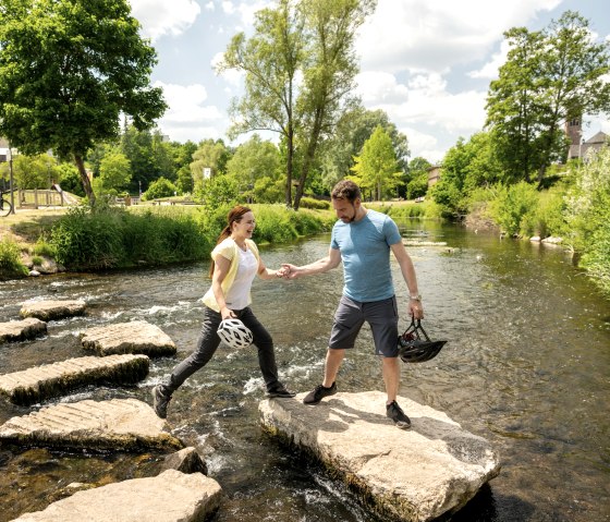 Stepping stones in the Kyll in Gerolstein spa gardens, © Eifel Touismus GmbH, Dominik Ketz