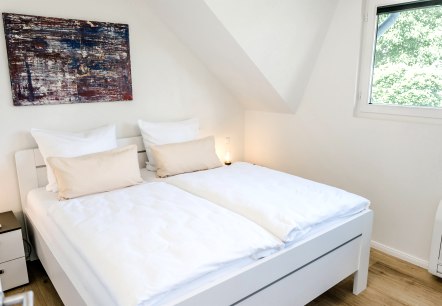 Schlafzimmer mit Doppelbett, &copy; Fotostudio Uschi Kitschke